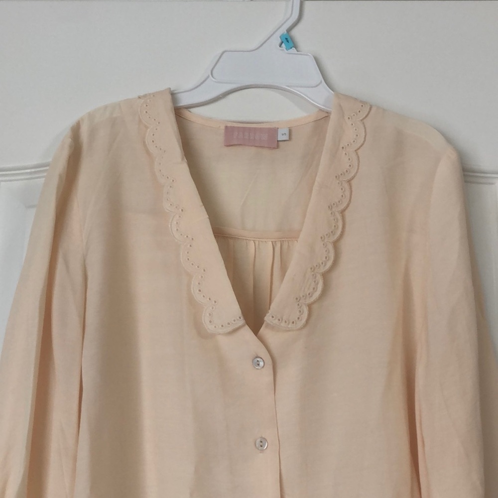 Beautiful cream blouse with great detailing
